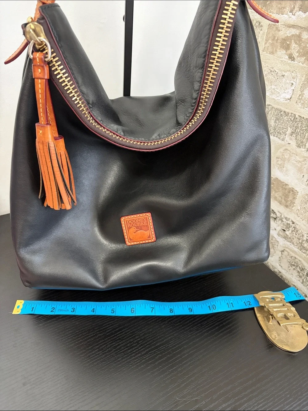 Dooney & Bourke needs screw